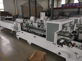 Máy dán hộp carto tự động